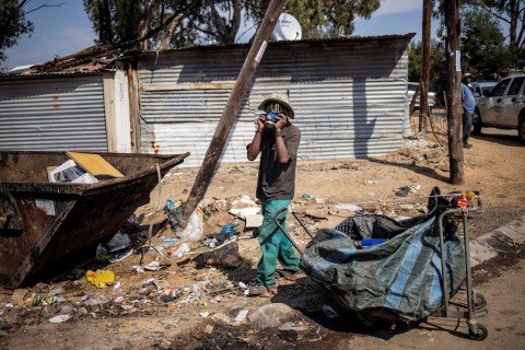 File: A waste picker seen in Diepsloot. AFP/Michele Spatari