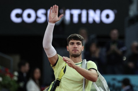 Spain's Carlos Alcaraz gestures after losing against Russia's Andrey Rublev. AFP/Thomas Coex