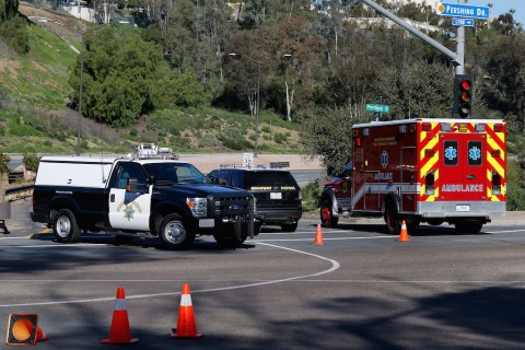 File: California Highway Patrol officers control traffic. Sean M. Haffey/Getty Images via AFP