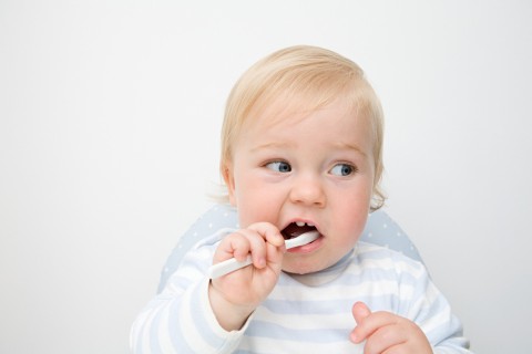 A baby boy brushing his teeth. Jackson J Russel/Connect Images via AFP