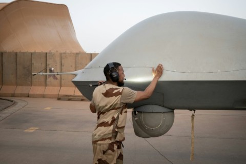 A French soldier checks a Reaper drone at the French base in Niamey in May. France has 1,500 troops in Niger under its anti-jihadist mission in the Sahel