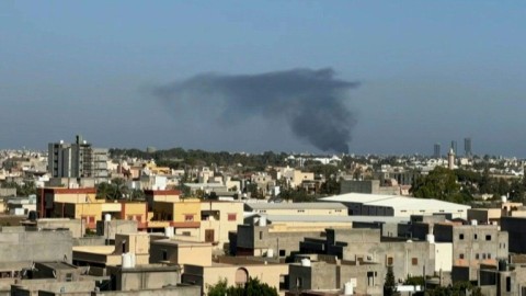 Libya: Smoke billows following overnight clashes between militants in Tripoli