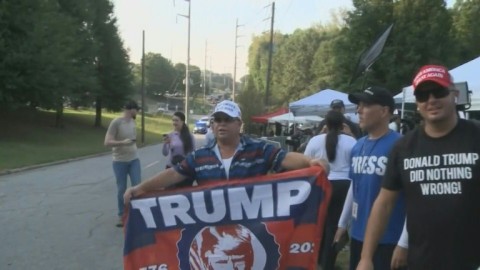 US: Trump supporters gather outside jail as former president's surrender looms