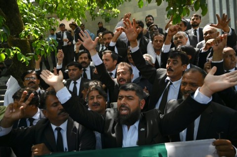 Lawyers and supporters of Pakistan's former prime minister Imran Khan outside the Islamabad High Court after the suspension of Khan's prison sentence for a graft conviction