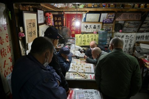 Men play the Chinese board game Xiangqi in the southern Chinese enclave of Macau