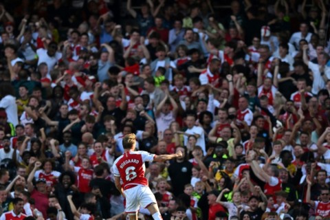 Arsenal midfielder Martin Odegaard celebrates his equaliser against Manchester United