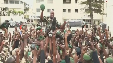 Oligui, seen in TV footage being carried aloft by his soldiers last Wednesday