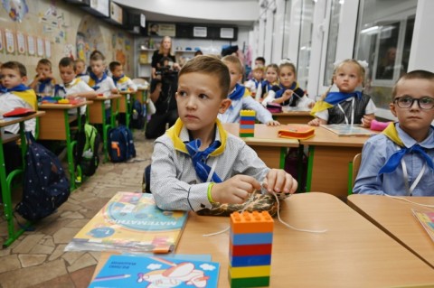 First grade pupils attend a class set up in a subway station in Kharkiv, eastern Ukraine