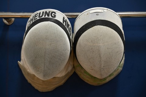 Masks used by members of the Hong Kong fencing team are seen during a media event in the city