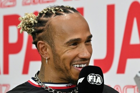 Mercedes' British driver Lewis Hamilton speaks to the media before the Formula One Japanese Grand Prix at Suzuka