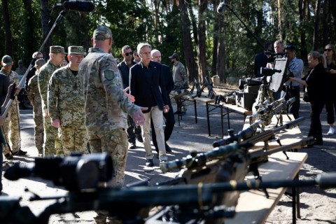 US Secretary of State Antony Blinken, an advocate for providing military aid to Ukraine, looks at weapons while he tours a Ukraine supply site near Kyiv on September 7, 2023