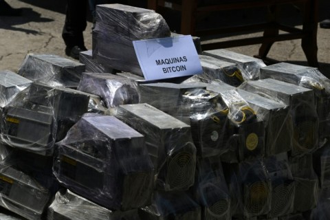 Bitcoin mining machines confiscated inside the Tocoron prison are displayed during a press conference 