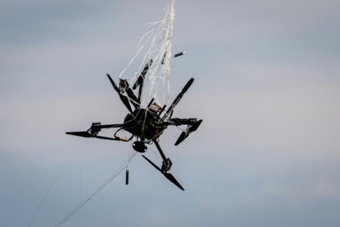 One possible defence is to snare a flying drone in a net
