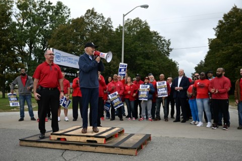 Biden addressed striking auto workers on the picket line through a bullhorn on Tuesday