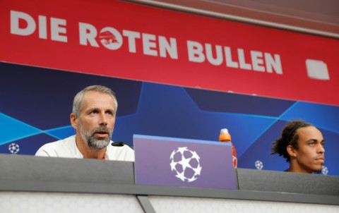 Leipzig head coach Marco Rose (L) and forward Yussuf Poulsen at a press conference ahead of the clash with Manchester City