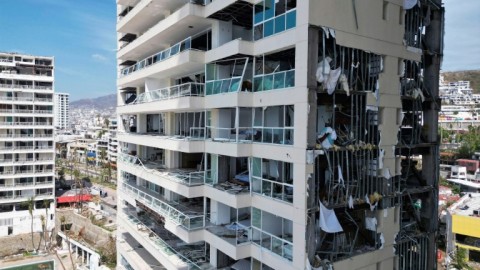 View of a building partially destroyed by Hurricane Otis in the Mexican resort city of Acapulco