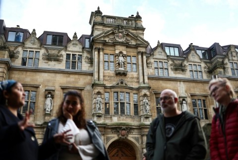 In Oxford, tourists are shown the statue of British coloniser Cecil Rhodes