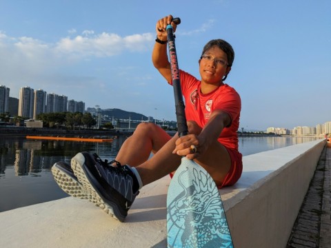 Helene Germain from France is competing in the dragon boat race at the Hong Kong Gay Games