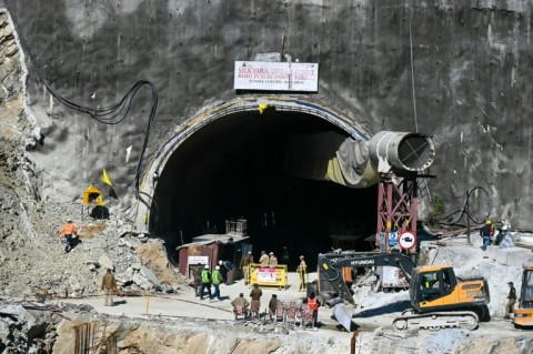 Rescue personnel work at the mouth of the Silkyara tunnel on Friday