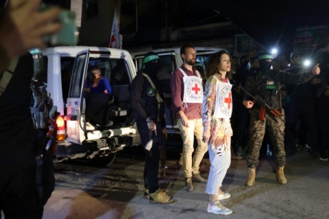 Instead of being hailed for its role in bringing out many of the freed hostages, the ICRC has been slammed on social media as a 'glorified taxi service'