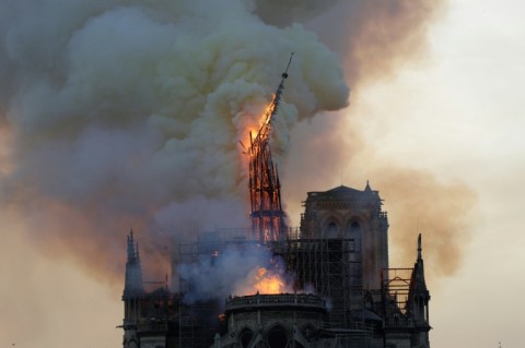The image of the spire in flames crashing to the ground made front-page news around the world
