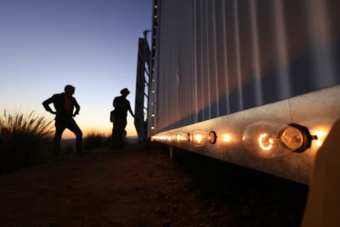 Thousands of lights illuminated the original sign, but just a small section was lit on to mark its 100th anniversary