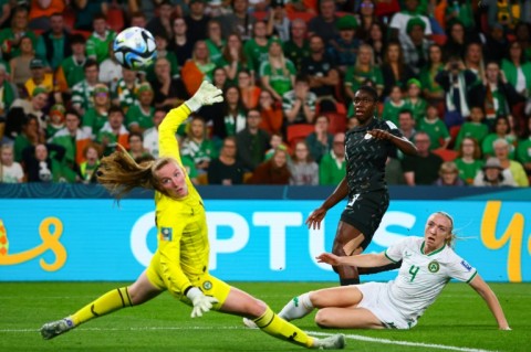 Asisat Oshoala (C) shoots for Nigeria against the Republic of Ireland during a 2023 Women's World Cup match in Brisbane
