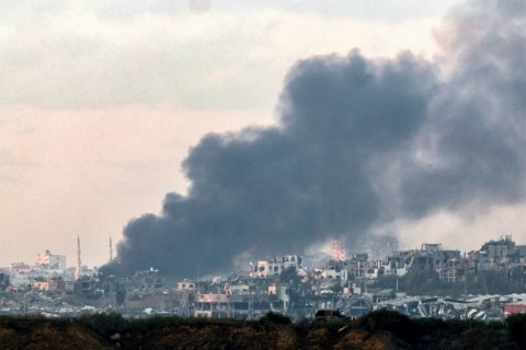 Smoke billows over the northern Gaza Strip during Israeli bombardment from southern Israel