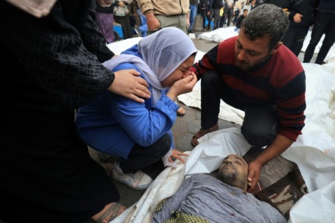 Israeli air strikes hit three houses, killing at least 70 people in Al-Maghazi, the health ministry in Hamas-run Gaza said