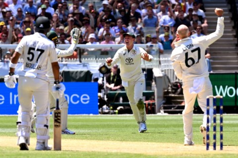 Pakistan's bowler Aamer Jamal celebrates dismissing Australia's batsman Marnus Labuschagne