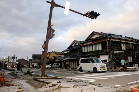 Pavement was left cracked on a street in the city of Wajima after the quake
