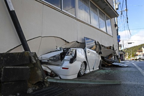 Cars were crushed under crumbling concrete