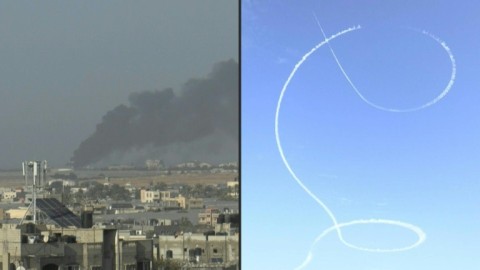 Smoke billows over Khan Yunis, aircraft flies over Rafah