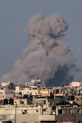 Smoke billows after an Israeli strike in Rafah