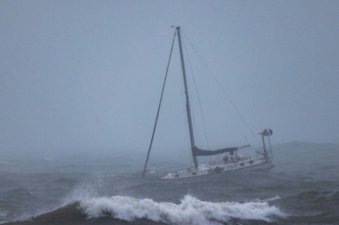 A moored boat is tossed by rough waters off Santa Barbara, California on February 4, 2024