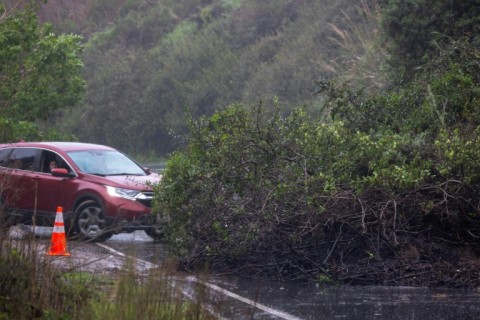 A driver is turned back by a mud slide blocking the road near Santa Barbara, California, on February 4, 2024