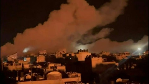Smoke billows following air strikes on Rafah during Israeli operation to release hostages