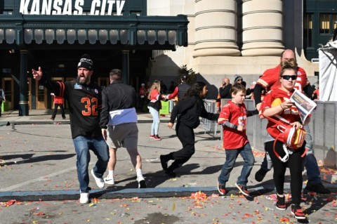 People flee after shots were fired at Union Station near the Kansas City Chiefs' Super Bowl LVIII victory parade