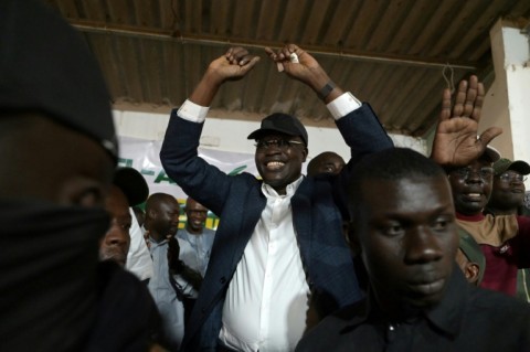 Sall talked to local residents and activists as he made his way through the stalls, workshops and houses