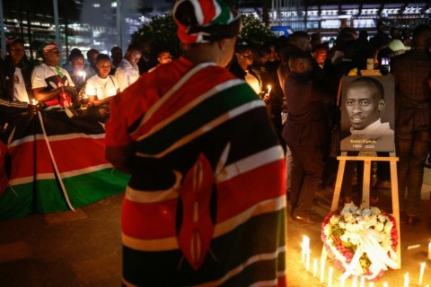 Hundreds turned out for a solemn candlelight vigil on the eve of Kiptum's funeral 