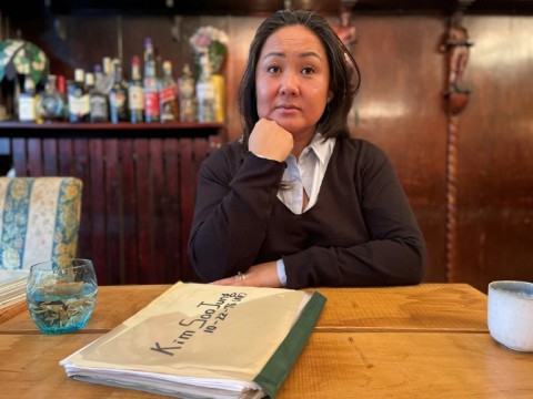 May-Britt Koed with her adoption papers in Copenhagen, Denmark