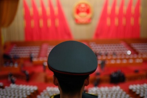 The annual political conclave opened with a rendition of China's national anthem