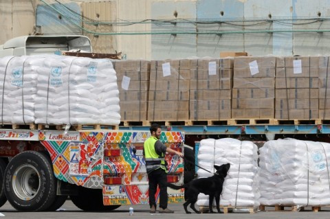Only a fraction of the aid needed to sustain Gaza's 2.4 million people enters by land, UN and humanitarian officials say