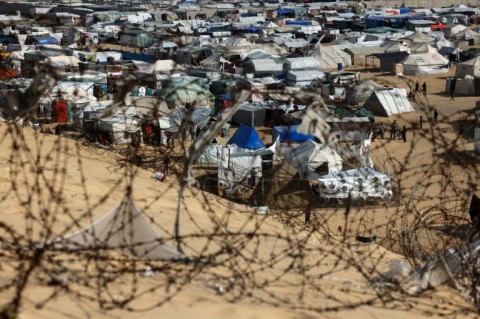 Barbed wire surrounds a camp for displaced people in Rafah, where around 1.5 million people have sought refuge