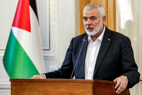 Ismail Haniyeh, the Doha-based political bureau chief of the Palestinian Islamist movement Hamas, speaks to the press after a meeting with the Iranian foreign minister in Tehran on March 26, 2024