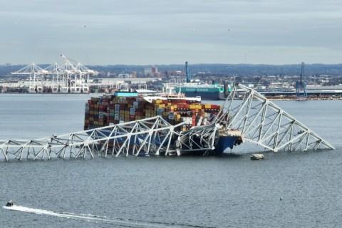 The disaster occurred at dramatic speed as the ship, piled high with containers, slammed into one of the bridge supports