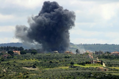 Smoke billows after an Israeli strike on the southern Lebanese border village of Tayr Harfa on April 6, 2024