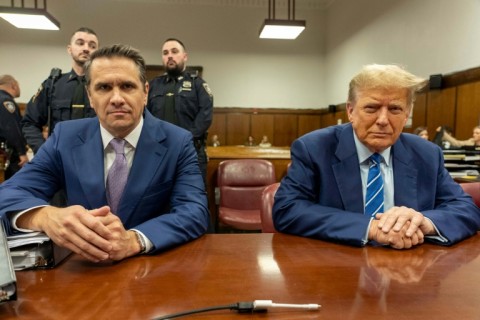 The scene is a long way from Trump's customary luxury homes or the raucous rallies where adoring crowds chant his name