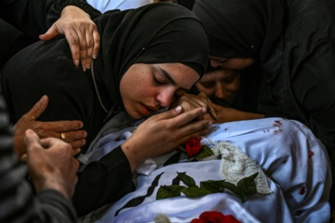 A woman mourns a man killed during an Israeli raid on the Nur Shams refugee camp in Gaza