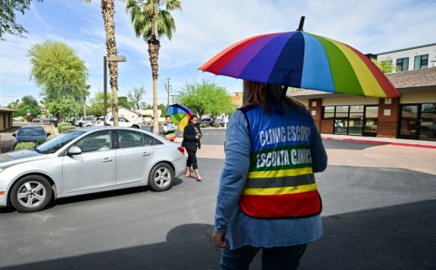 Clinic escorts wait to greet arrivals at Camelback Family Planning, an abortion clinic in Phoenix, Arizona 